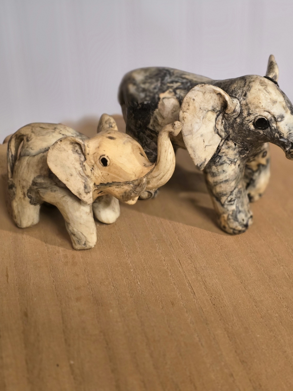 Set of Two Decorative Ivory and Gray Elephant Sculptures - Home Art